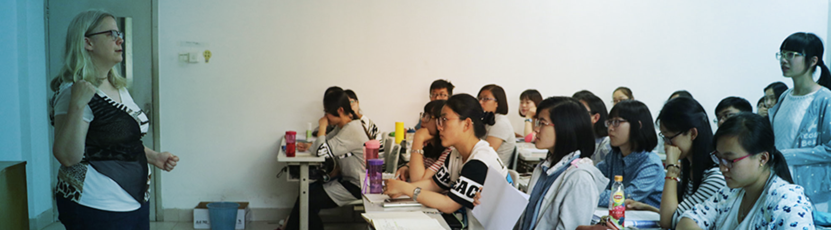 Dr. Heather Hallen-Adams teaching a classroom of Chinese students