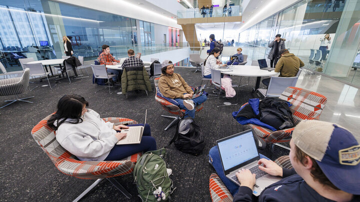 Students studying a lounge